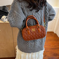 Niche pleated mini pillow bag 2025 new shoulder fashion crossbody bag autumn and winter retro handheld bowling bag