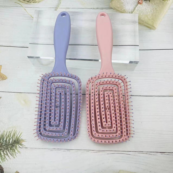 New candy color ribs big curved comb hair comb high cranial top fluffy mosquito coil rotary comb manufacturer wholesale