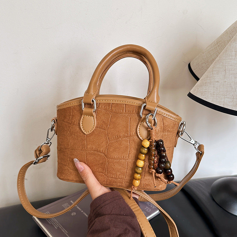 minimalist premium embossed handbag for women, 2025 new arrival, unique design, commute & casual crossbody bucket bag