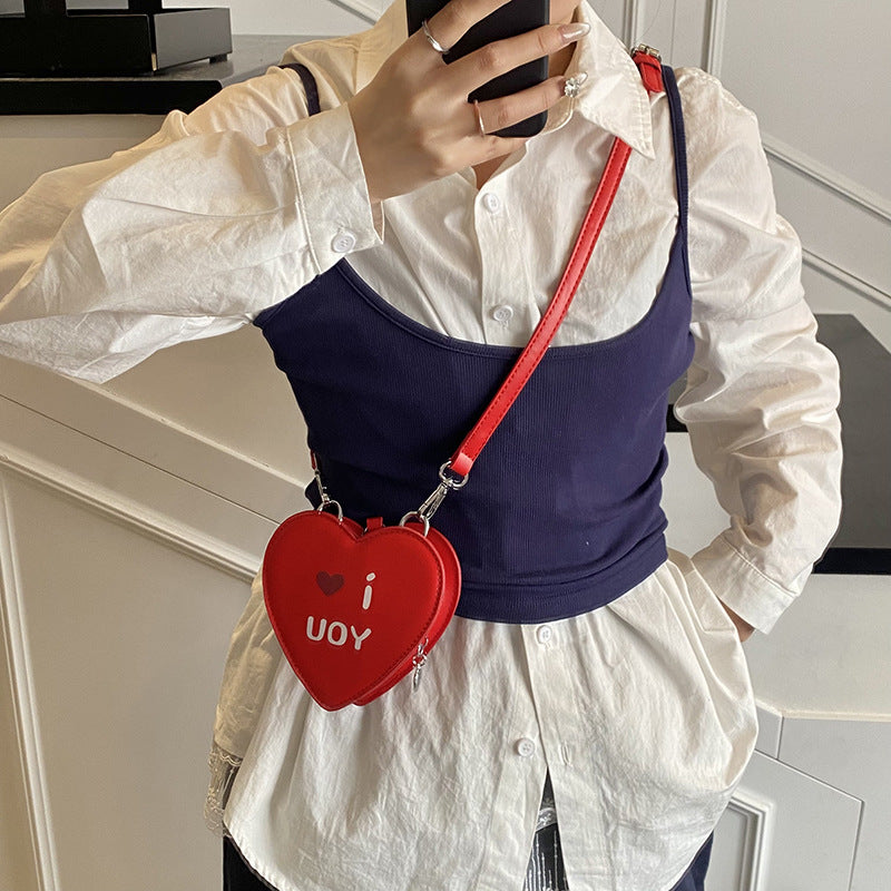 2025 summer new cute casual style small bag women's niche design sense messenger bag printed heart-shaped mouth red envelope