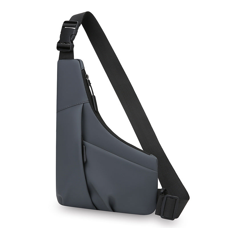 New men's light and close-fitting triangular bag, simple leather film texture shoulder messenger bag, trendy and cool casual portable breast bag
