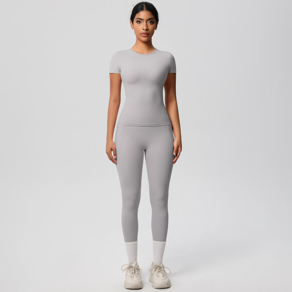 European and american solid color nude feel brushed short-sleeve yoga top and high-waisted butt-lifting fitness leggings quick-dry running workout set