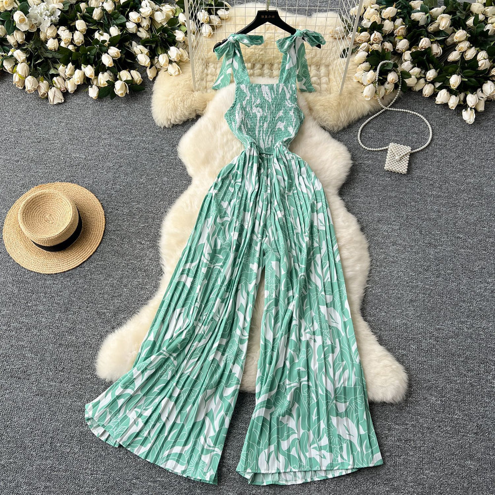 Women's summer jumpsuit for travel & vacation: stretchy, ruched, cinched waist, floral print, spaghetti strap, wide leg, long pants, beachwear