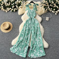 Women's summer jumpsuit for travel & vacation: stretchy, ruched, cinched waist, floral print, spaghetti strap, wide leg, long pants, beachwear