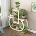 Creative iron art flower stand - freestanding, multi-tiered plant stand for balconies, living rooms, and home use - wall-mounted planter shelf