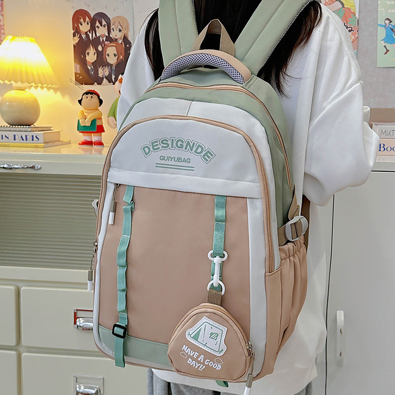 School bag female primary school students large-capacity contrasting color simple Japanese backpack 2025 new junior high school travel backpack