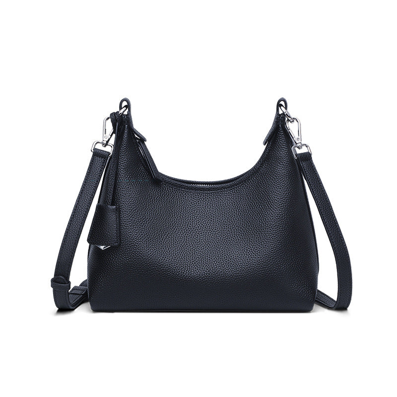 Genuine leather shoulder bag 2025 spring new niche design women's bag temperament advanced simple first layer cowhide messenger bag