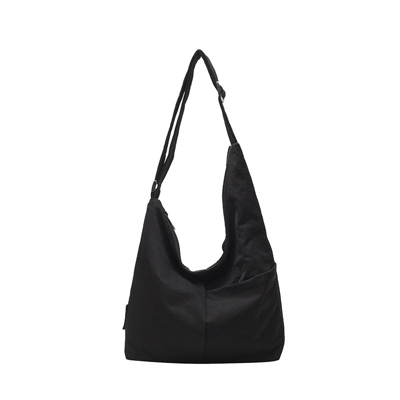 Foreign single nylon cloth bag women's large capacity 2025 new summer leisure niche shoulder messenger bag commuter dumpling bag