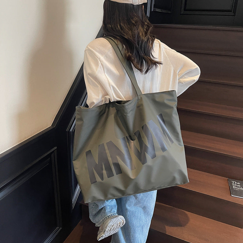 Cross-border college students take classes in tote bags 2025 summer new lazy style literary letter shoulder bags daily commuting bags