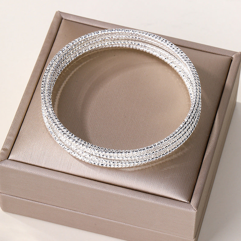 Wholesale alloy bangle sets for cross-border e-commerce: fashionable, small, multi-layered, plain circle bracelets for women (european & american style)