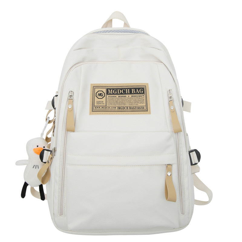 Spring and summer simple travel backpack computer backpack casual solid color ultra-light junior high school students large-capacity schoolbag