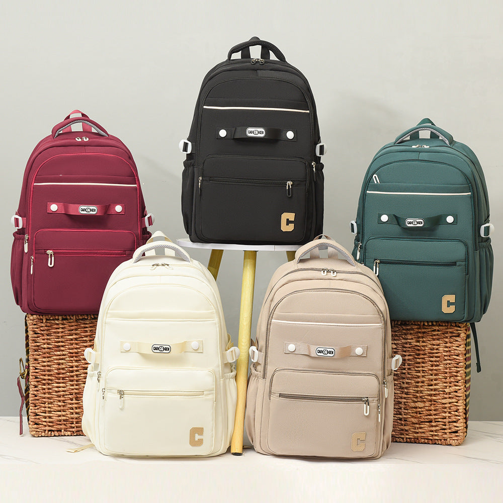 New solid color versatile student schoolbag large capacity backpack junior high school student computer backpack leisure travel