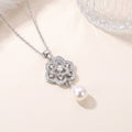 8442 pearl tassel flower steel necklace