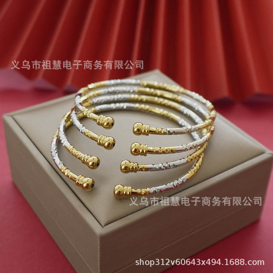 middle eastern two-tone beaded bracelet - elegant and stylish embossed pattern adjustable bangle - fashion accessory