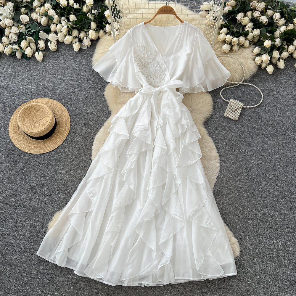 French chic v-neck flutter sleeve dress - new  collection: slimming, figure-flattering, ruffle hem maxi dress for an elegant and refined look