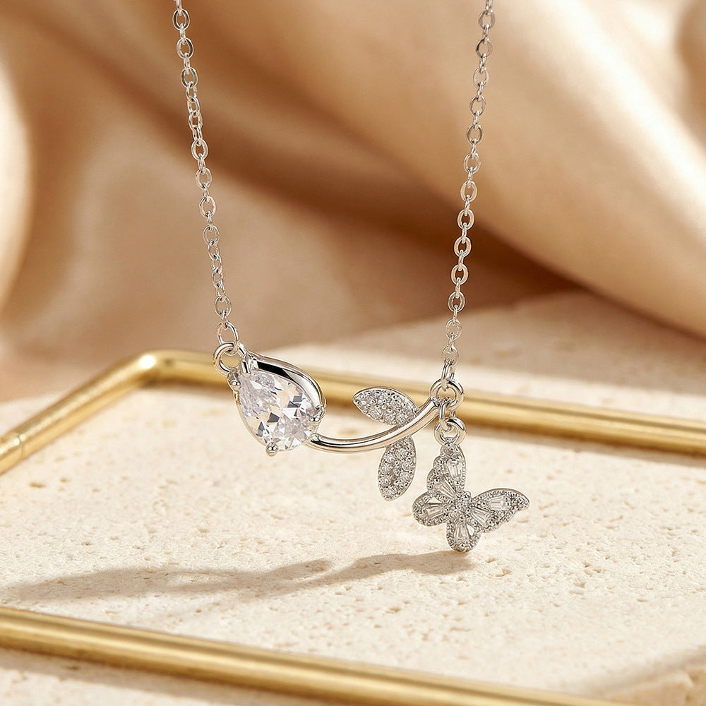 Popular and versatile copper-inlaid zirconium full-diamond tulip butterfly necklace for women, accessible luxury niche elegant clavicle chain jewelry