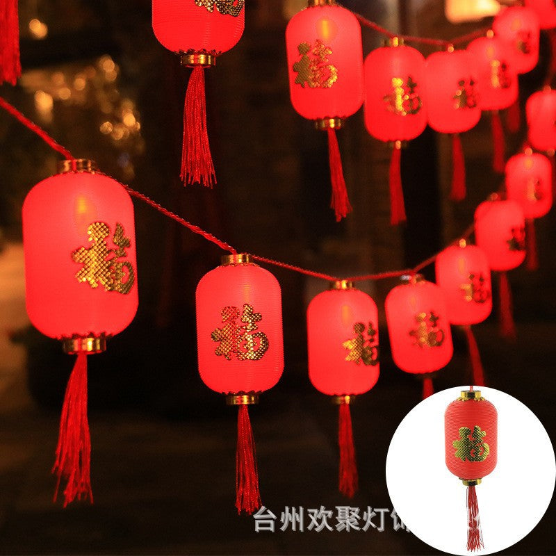 LED lantern string, Chinese New Year lanterns, Spring Festival flashing lights, festive Lantern Festival, New Year's fringed red lanterns