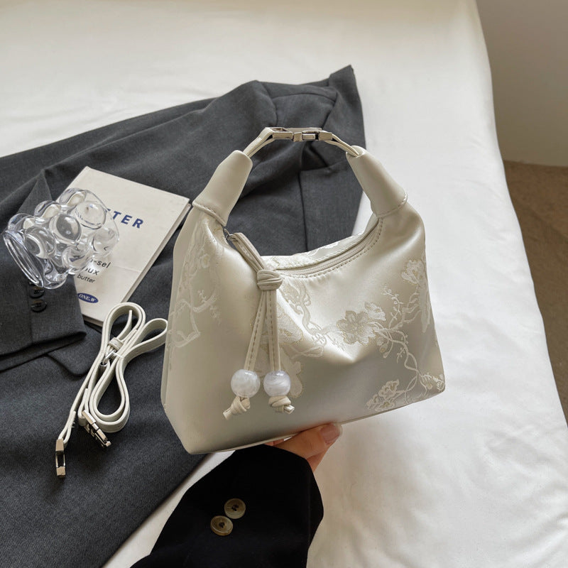 New Chinese style embroidered bag women's 2025 new fashion foreign style one shoulder messenger bag printed portable dumpling bag