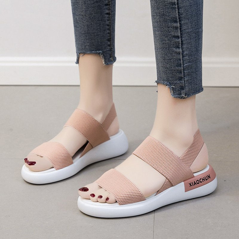 Sports sandals women's elastic elastic 2021 summer new student flat-bottomed outer wear fairy style Roman beach women's shoes