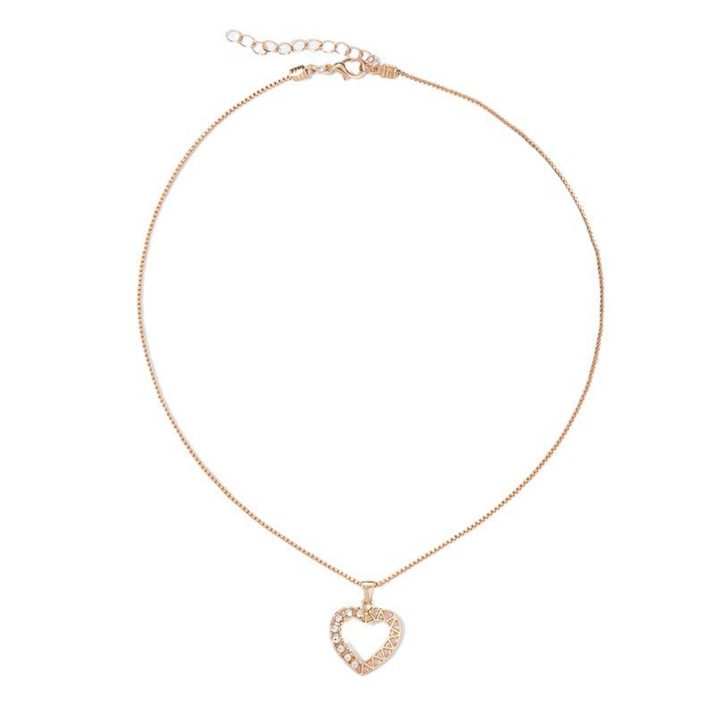 Gold clavicle chain wholesale european and american cross-border hollow heart pendant jewelry accessible luxury niche design heart-shaped necklace for women