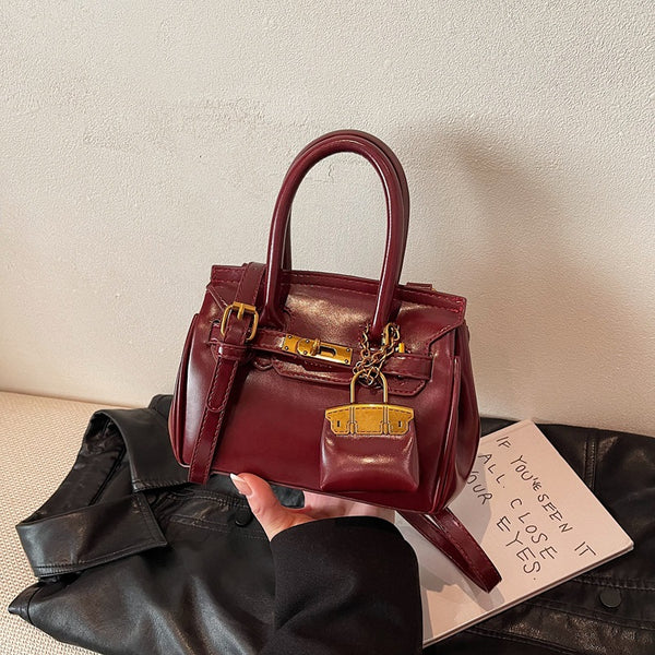 Premium sense oily leather platinum bag women's 2025 autumn and winter Maillard handbag hand bag shoulder messenger Kelly bag