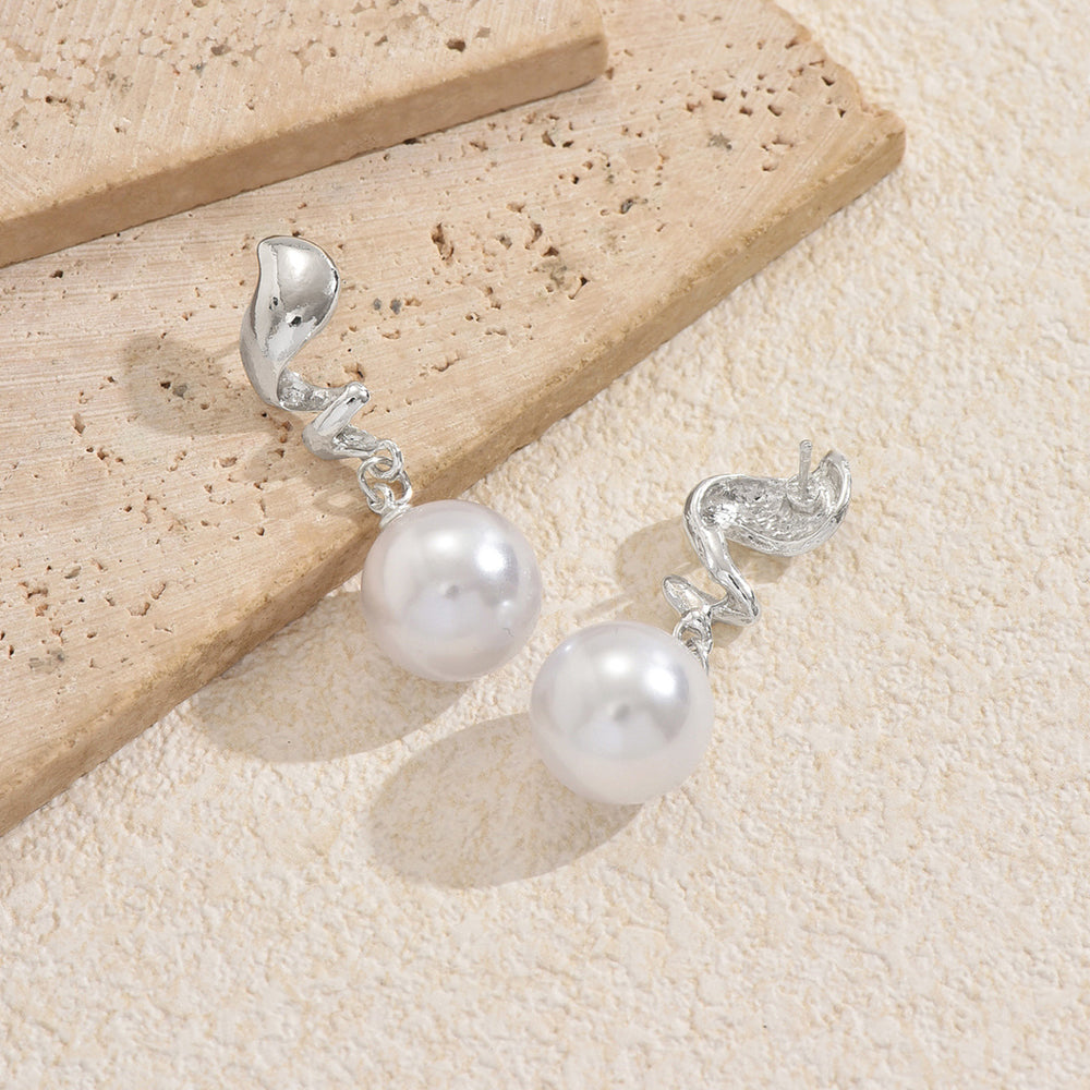 European and american cross-border creative pearl stud earrings: high-end geometric spiral flame, unique and elegant vintage earrings for women