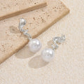 European and american cross-border creative pearl stud earrings: high-end geometric spiral flame, unique and elegant vintage earrings for women