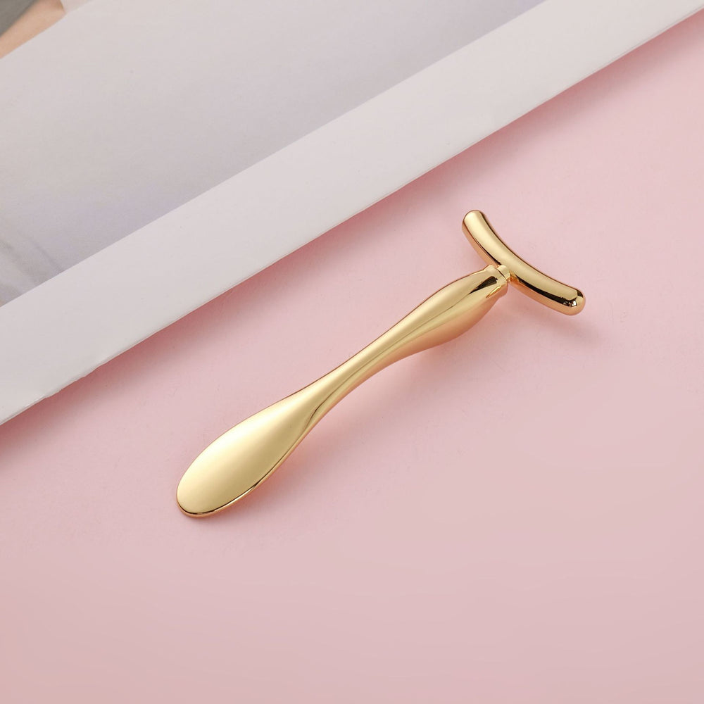 Wholesale large t-shaped facial massage roller, cosmetics essence infusion wand, golden face slimming beauty eye cream applicator