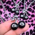 Wholesale necklace accessories: european & american cross-border jewelry - minimalist black cherry & billiard ball pendants, skull necklaces