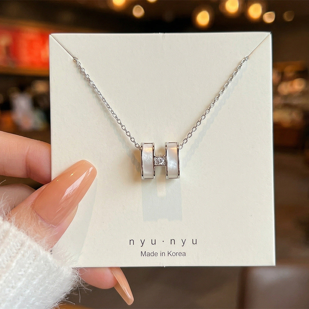Copper inlaid zirconium four-leaf clover necklace for women, titanium steel real gold plating popularinsfashion flower exquisite sweater chain jewelry
