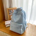 New schoolbag large capacity water-resistant embroidered backpack for junior and senior high school students - solid color, simple, and cute design