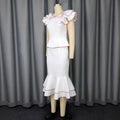 Elegant women's ruffle trim color block top and figure-flattering fishtail midi skirt two-piece set