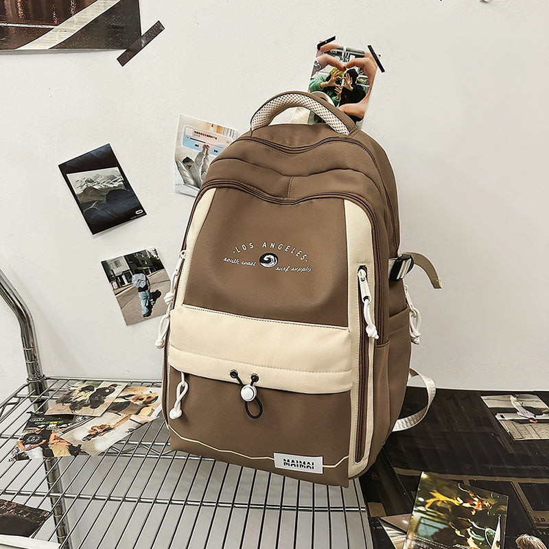 2025 new forest-inspired, high-style, large-capacity, durable, color-blocked backpack for middle and high school students, college students, and travel