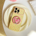 Trendy, custard-yellow iphone 17 case with a full-color heart design and stand. available in contrasting color iphone 18 soft case styles