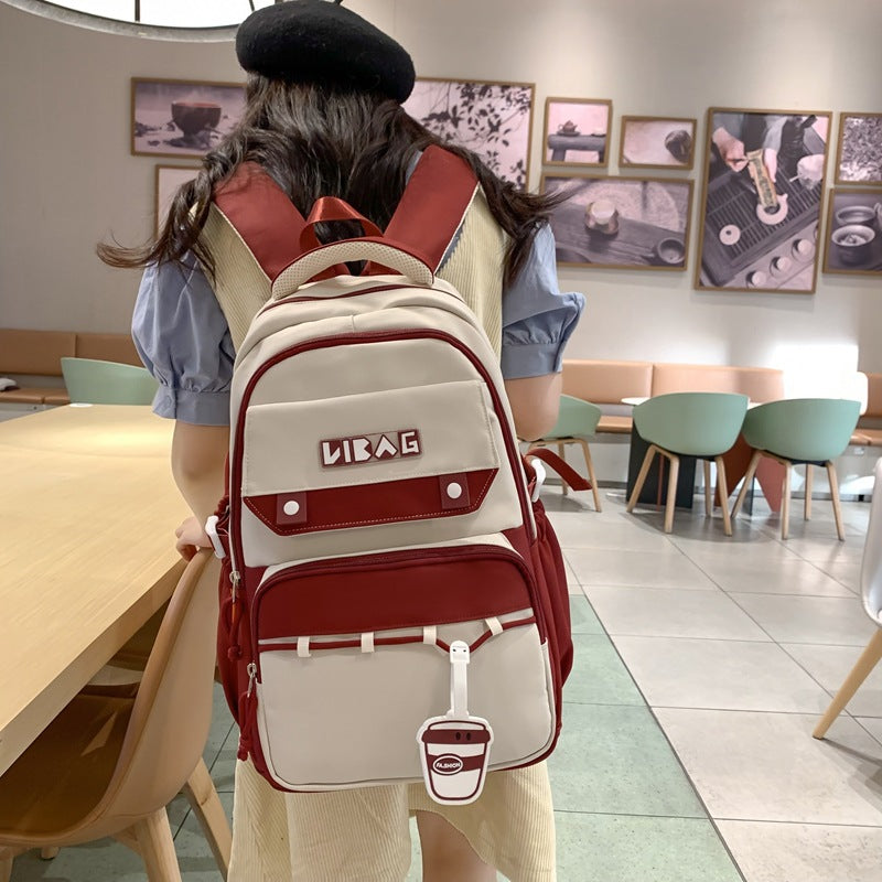 New large-capacity schoolbag male junior high school students contrasting color double backpack Korean version college student couple fashion backpack