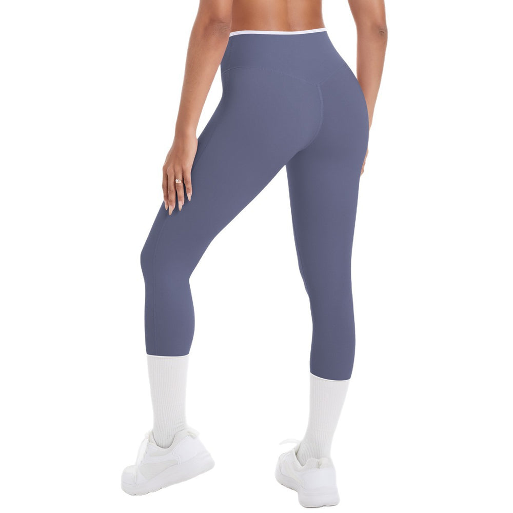 Naked-feel, figure-hugging, high-waisted yoga pants with a contrasting color block design. perfect for outdoor leisure, running, and quick-drying fitness workouts