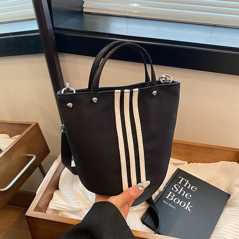 Casual simple and lightweight bag women's 2025 summer new Korean version fashion nylon bucket bag commuter shoulder bag