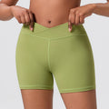 Three-quarter pants pure colorhigh waist tummy control butt lift peach tight fitness sports pants front cross outwear yoga shorts