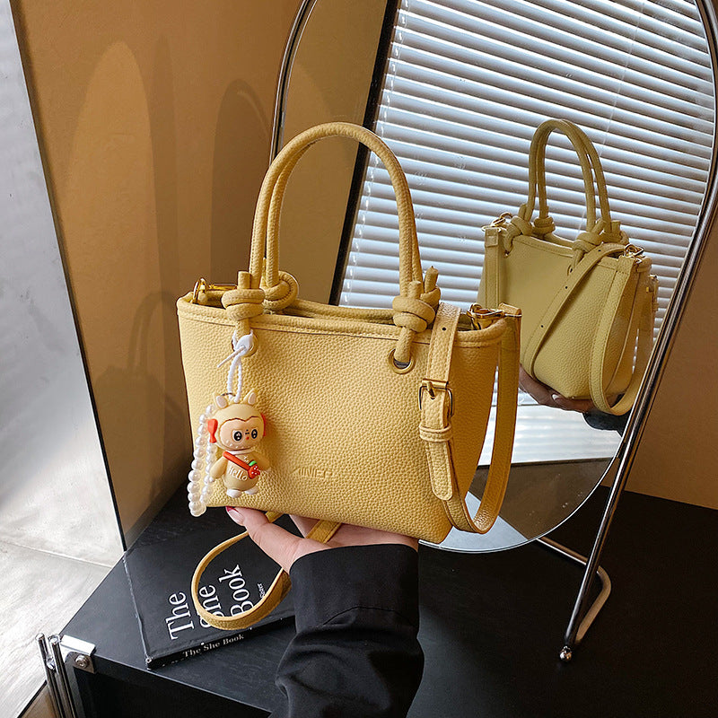 Foreign trade advanced sense hand carrying bucket bag 2025 summer simple and versatile shoulder bag trendy niche design messenger bag