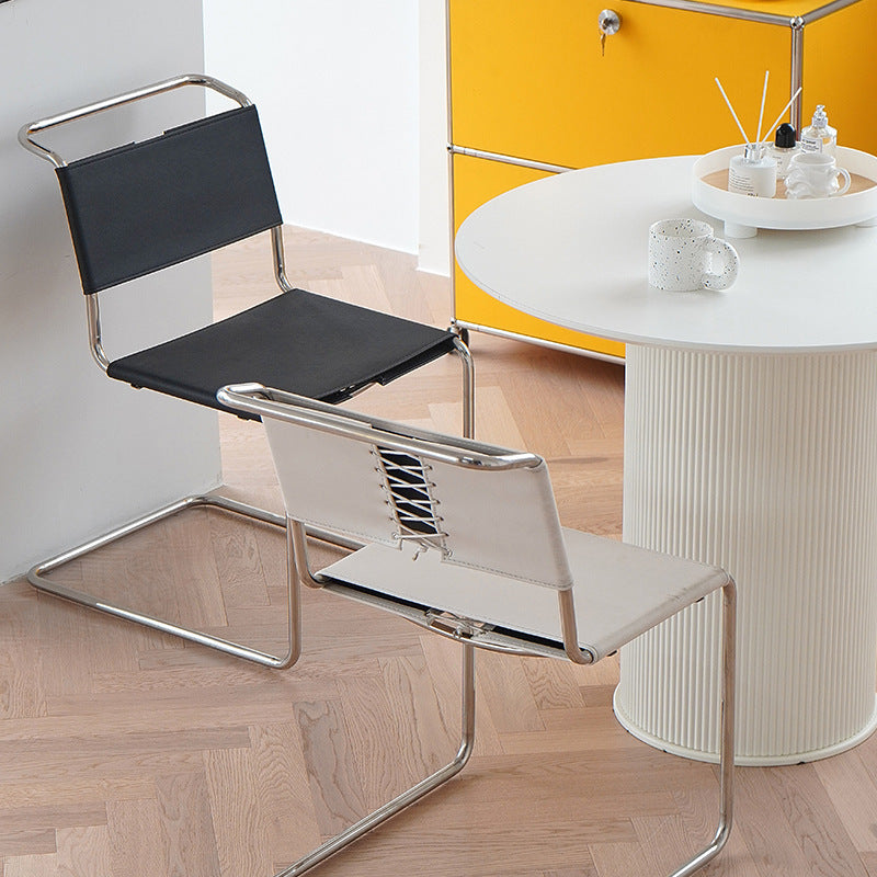 Modern casual saddle leather cantilever chair medieval style dining chair restaurant hotel milk tea shopaccessible luxuryretro saddle chair