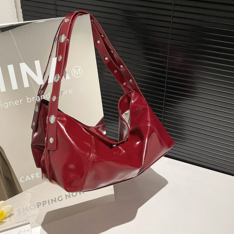 Cross-border European and American style large-capacity rivet punk shoulder bag women's 2025 new fashion personalized underarm bag commuter bag