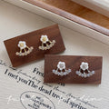 Fashion daisy flower earrings small fresh exquisite earrings 925 silver needle sense of design elegant earrings classy earrings