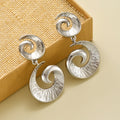 Wholesale spiral earrings: european and american style, unique, statement-making, high-end women's earrings, irregular geometric texture, gold stud earrings