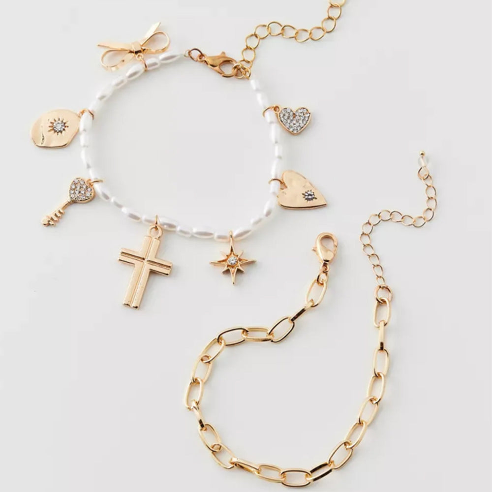 Wholesale faux pearl bracelets - european & american style, stackable, designer jewelry with cross, heart, bow, and star charms