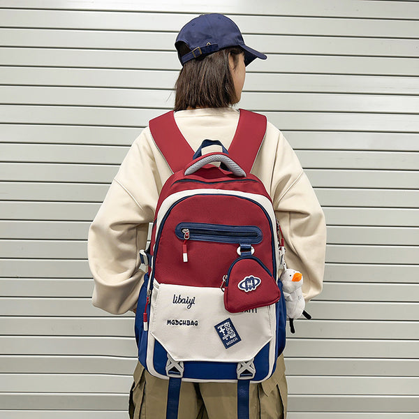 Student schoolbag to reduce the burden of spine care, junior high school, high school, college students, female backpack, large capacity, high value and lightweight backpack.