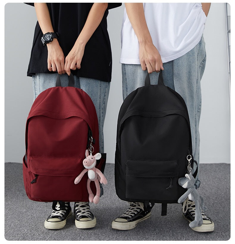 Cross-border new couple backpack, junior high school student schoolbag, college student backpack, casual wind, large-capacity simple bag