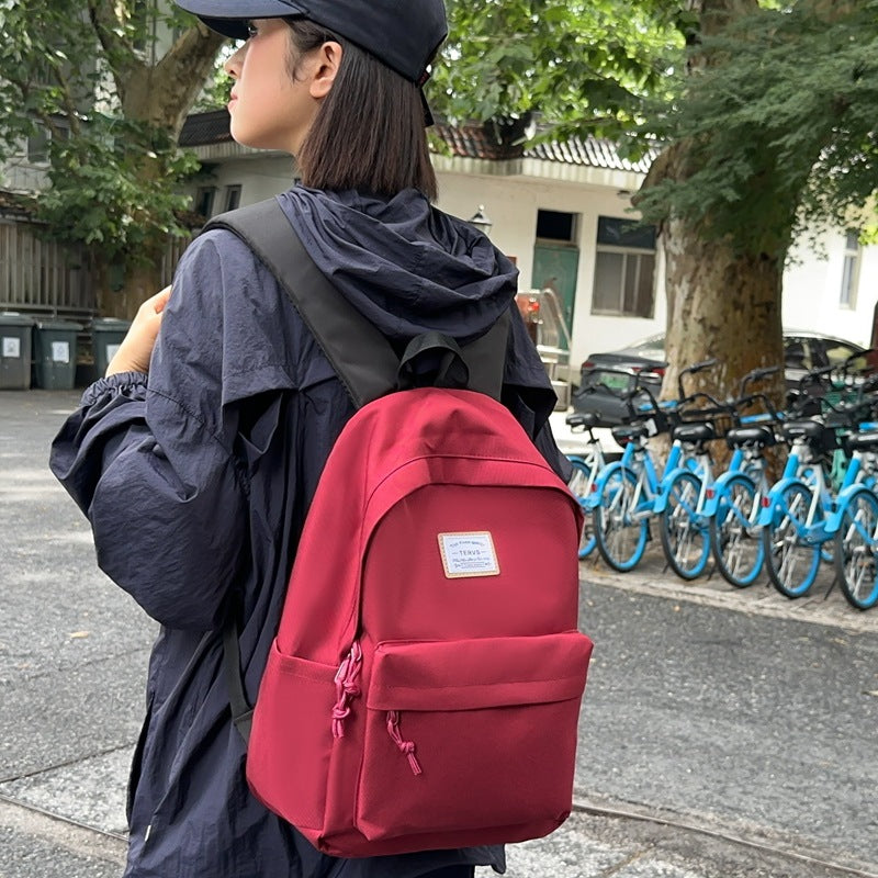 New fashion simple trend backpack large capacity lightweight travel backpack Korean version of junior high school student schoolbag