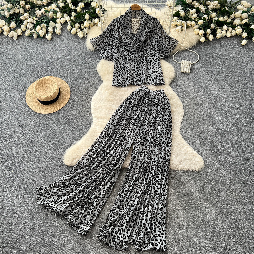 Leopard print vacation-ready two-piece set: summer chic, high-waisted wide-leg pants, effortlessly stylish and youthful
