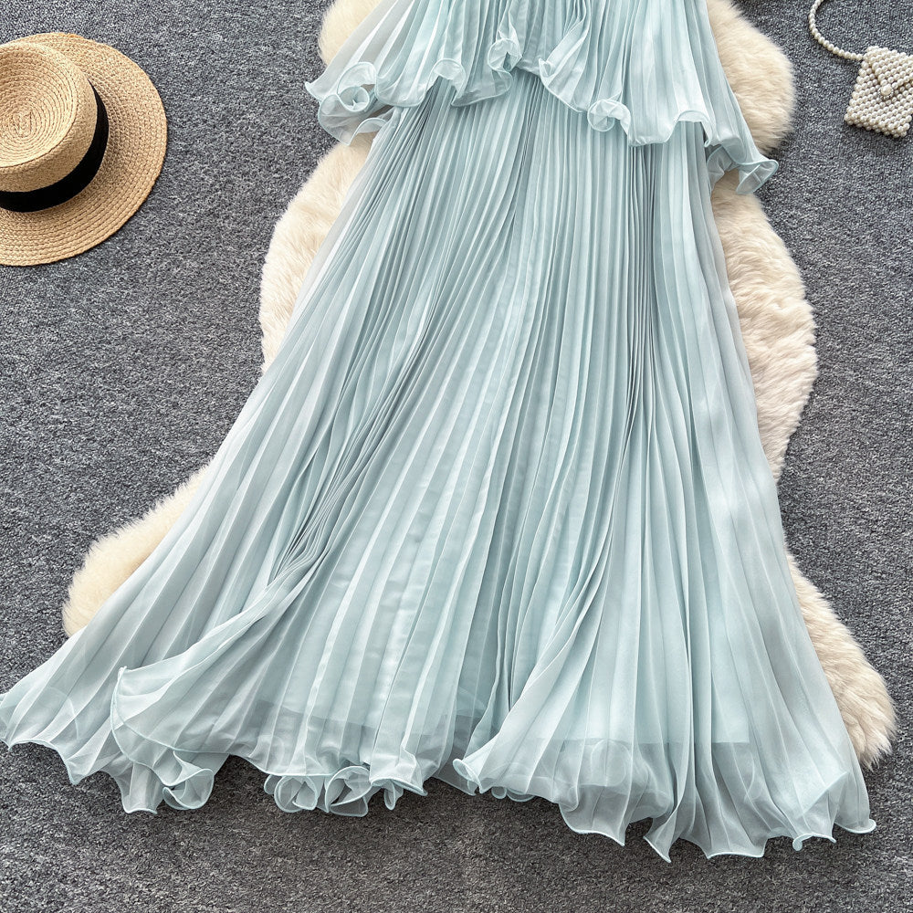 Vacation-style light blue camisole sleeveless dress for women, featuring a summer ruffle trim, high waist, slimming effect, and pleated fairy-length skirt