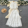 French retro court style two-piece set: women's loose-fit crochet lace patchwork short-sleeve top and high-waisted midi skirt